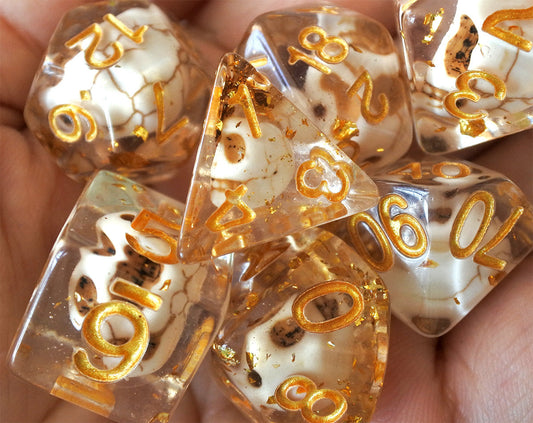 Skulls Laying in Golden Treasure Dice Set (Give away a random dice set)