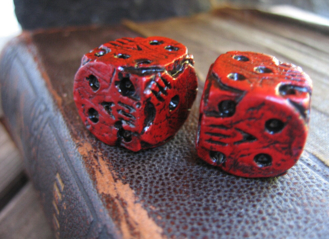 Hand cast red skull dice