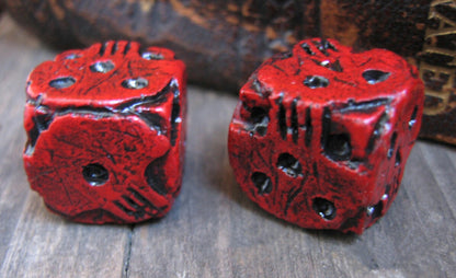 Hand cast red skull dice